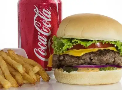 Cheeseburger + Regular Fries + Can Pop image