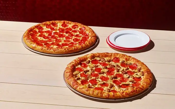 2 medium pizzas $7 each image