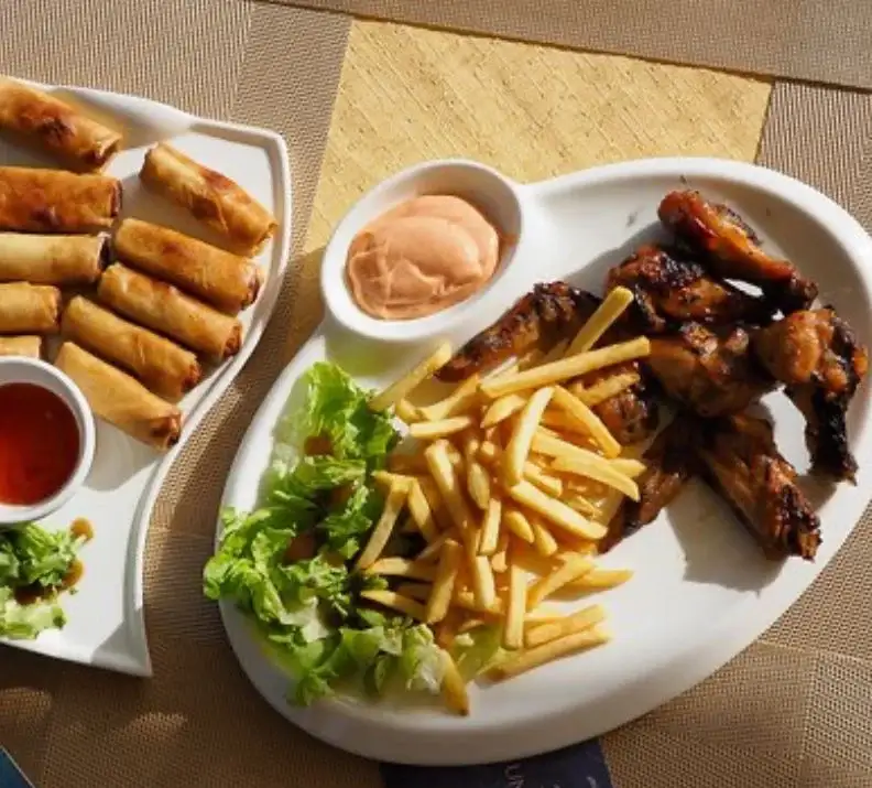 2 lbs Wings, Fries & Veggie Spring Rolls image
